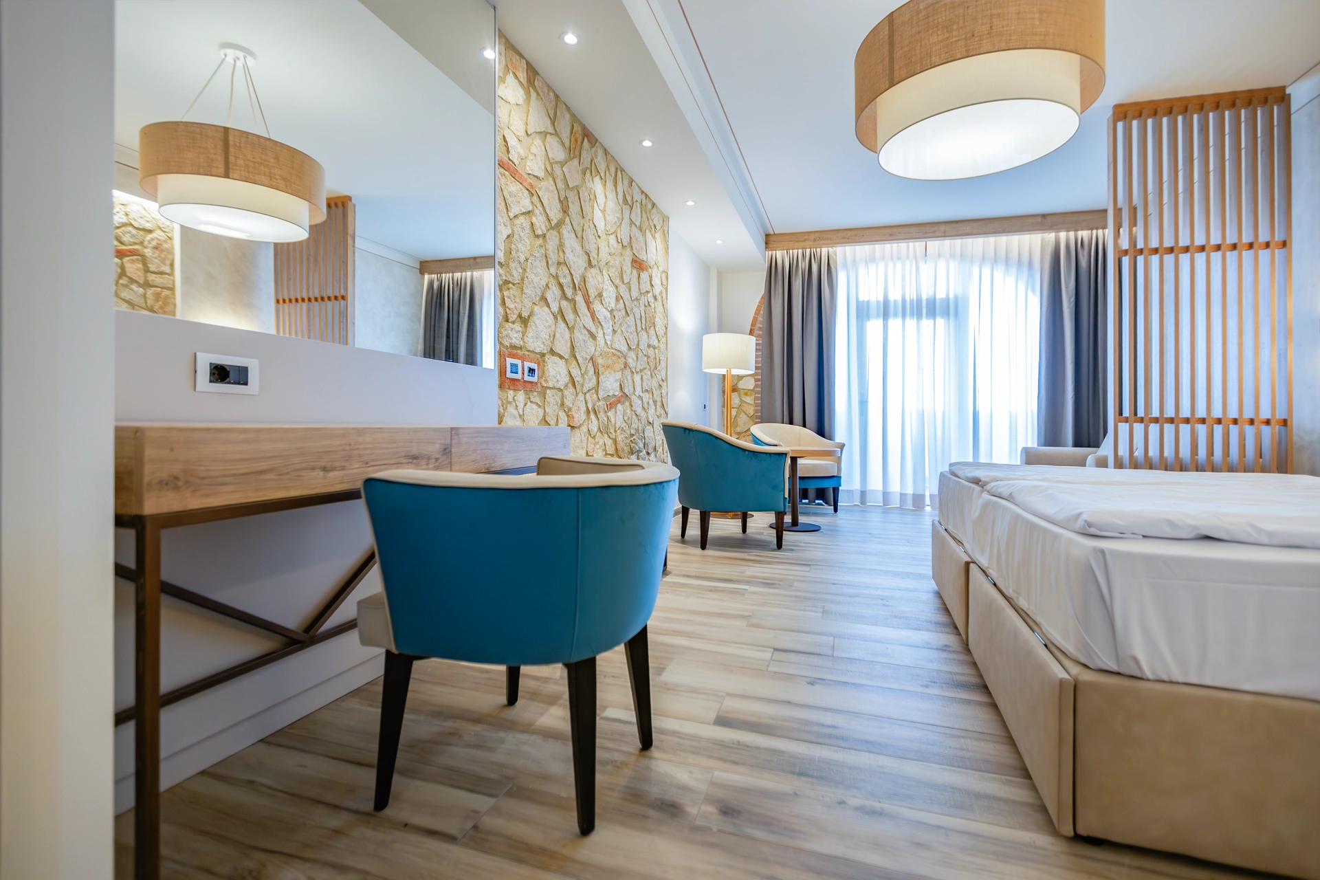 camera deluxe tripla del resort della Tenuta Elisabetta